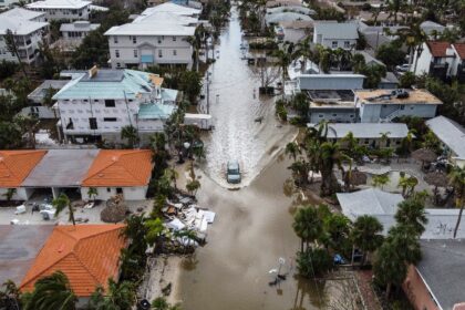 The small town on Siesta Key, with a population of roughly 5,000, was hit hard by dual hur