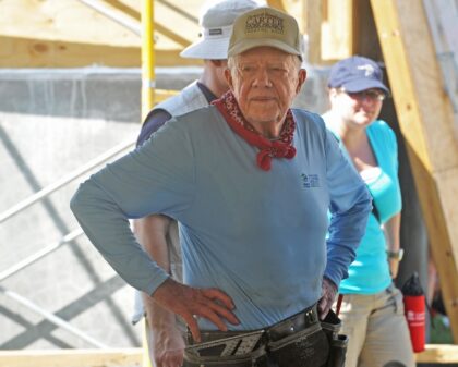 Former US president Jimmy Carter, shown here helping to build a house for earthquake victi