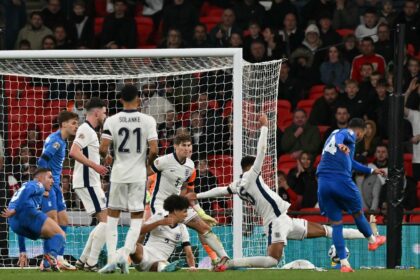 Vangelis Pavlidis (R) scoring Greece's winner against England