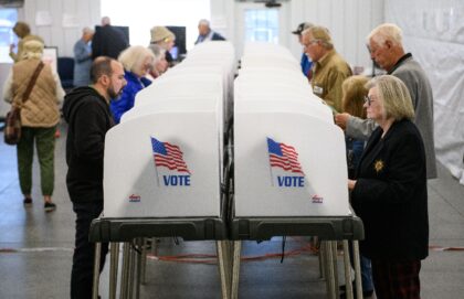 Voters cast ballots in the US election at an early voting site in Hendersonville, North Ca