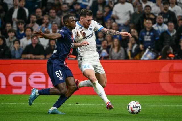 Willian Pacho challenges Marseille forward Pierre-Emile Hojbjerg during PSG's 3-0 win last