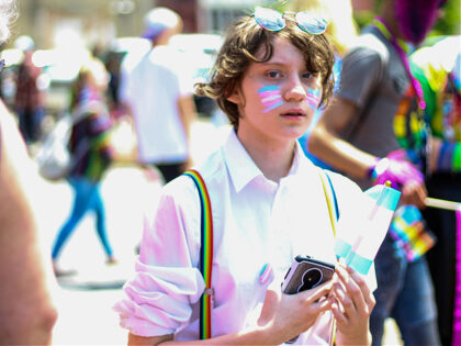 youth with transgender flag