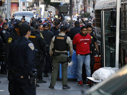 Protesters who refused to stop blocking Powell Street are arrested by San Francisco police