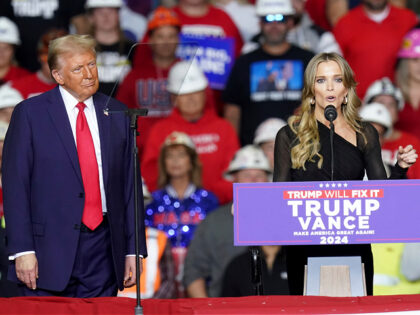 Republican presidential nominee former President Donald Trump listens as Megyn Kelly speak