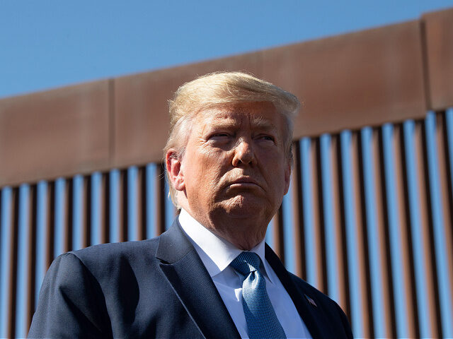 TOPSHOT - US President Donald Trump visits the US-Mexico border fence in Otay Mesa, Califo