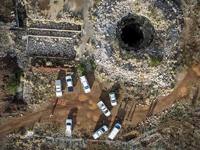 An aerial view of a mine shaft where an estimated 4000 illegal miners are trapped in a dis