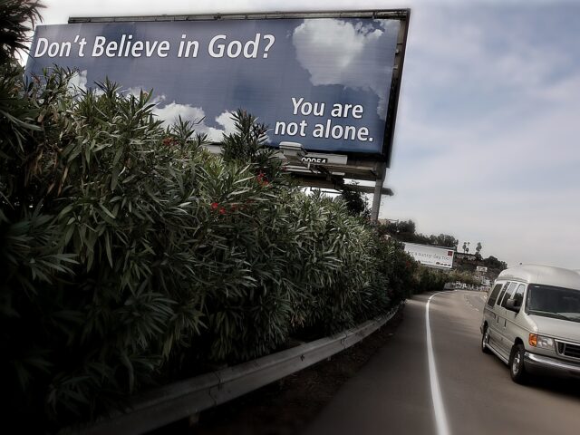 A sign is displayed along Interstate 8 in San Diego, CA by The San Diego Coalition of Reas