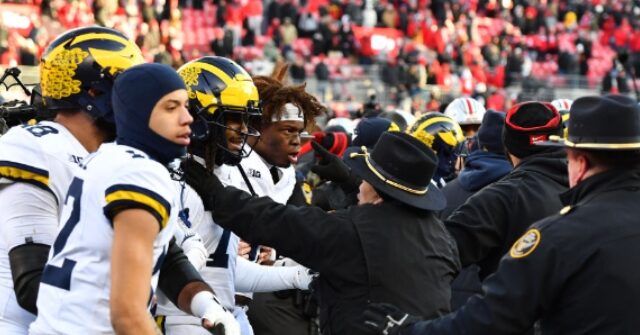 WATCH: Chaos in Columbus: Ohio State-Michigan Game Ends in Wild Brawl After Wolverines Plant Flag on Buckeye Logo