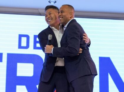 FILE - House Minority Leader Hakeem Jeffries, D-N.Y., greets Derek Tran during a campaign