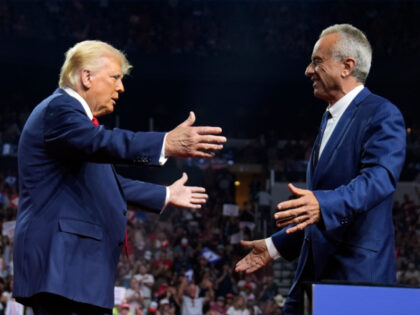 Republican presidential nominee former President Donald Trump greets Independent president