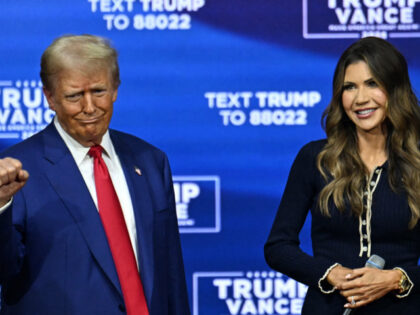 Former US President and Republican presidential candidate Donald Trump attends a town hall