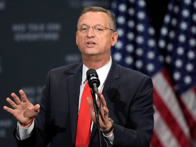 Former Rep. Doug Collins speaks before Republican presidential nominee former President Do