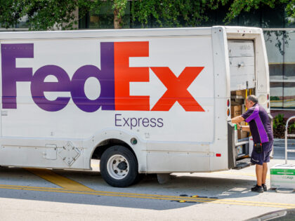 Miami Beach Florida,FedEx Express delivery van parked street,Federal Express,man driver un