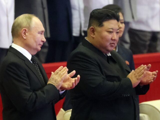 PYONGYANG, NORTH KOREA- JUNE 19 (RUSSIA OUT) Russia's President Vladimir Putin (L) and Nor