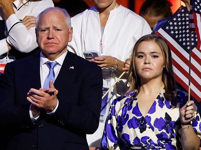 Democratic vice presidential candidate Minnesota Gov. Tim Walz and Hope Walz attend the fi