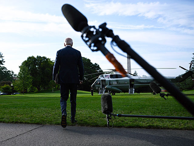 US President Joe Biden walks to board Marine One after speaking to the press as he departs