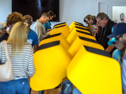 People mark their ballots at the Neptunian Womans Club-Manhattan Beach vote center on Nove