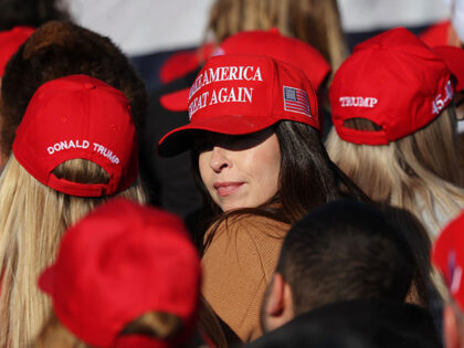 Supporters of Republican presidential nominee, former U.S. President Donald Trump speaks a