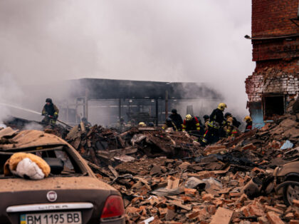 SUMY, UKRAINE - NOVEMBER 26: Firefighters remove debris after Russian missile attack on No