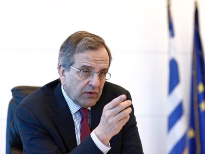 Antonis Samaras, former Greek prime minister and leader of the New Democracy party, gestur