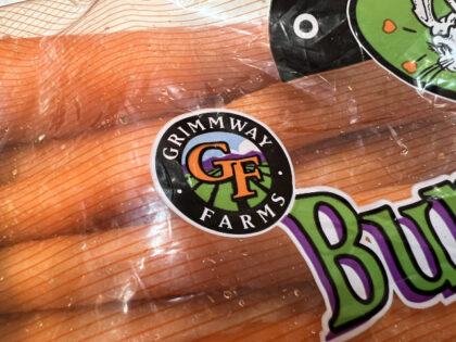 Close-up of Grimmway Farms logo on a bag of organic carrots, Lafayette, California, Novemb