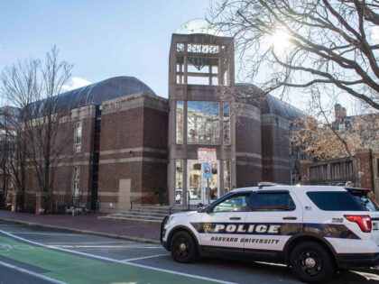 A police car stands outside the jewish student organization HILLEL's building at Harv