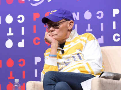 Sarah Huckabee Sanders (L) and James Carville speak onstage during day 2 of Politicon 2019