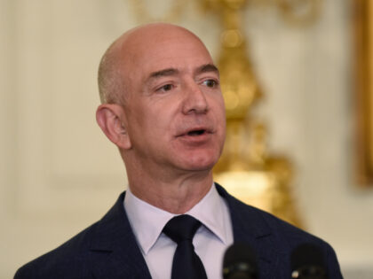 FILE - Jeff Bezos, the founder and CEO of Amazon.com, speaks in the State Dining Room of t