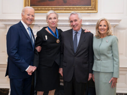 President Joe Biden and First Lady Jill Biden pose for a photo with Cecile Richards, forme