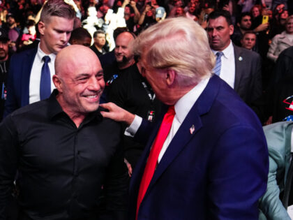 NEW YORK, NEW YORK - NOVEMBER 16: (L-R) Daniel Cormier, Joe Rogan and President-elect Dona