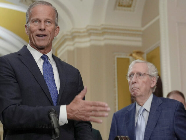 Sen. John Thune, R-S.D., center, talk as Sen. Minority Leader Mitch McConnell, R-Ky., righ