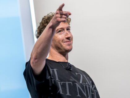 Mark Zuckerberg points to his audience