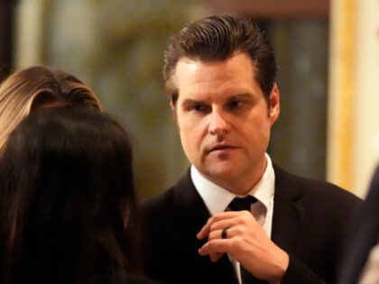 Matt Gaetz talks before President-elect Donald Trump speaks during an America First Policy