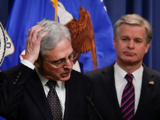 (L-R) U.S. Attorney General Merrick Garland and FBI Director Christopher Wray speak during