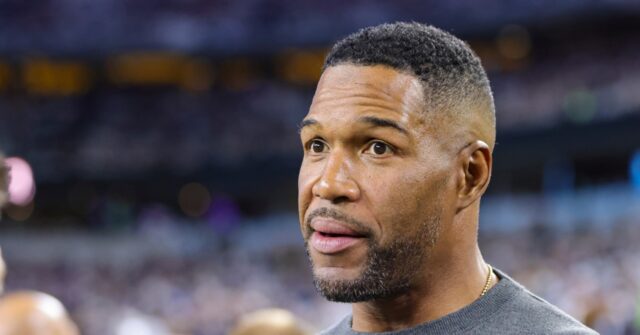 Fans Demand Michael Strahan Be Fired for Way He Stood During Veterans Day Weekend National Anthem