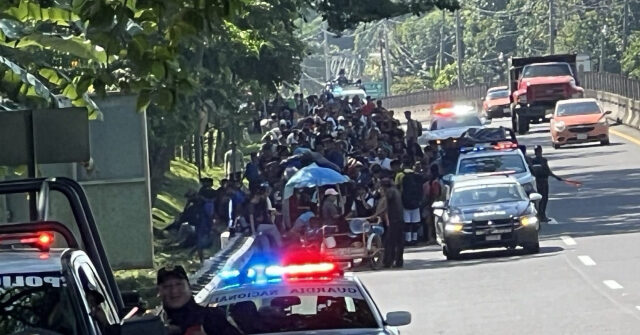 EXCLUSIVE PHOTOS: Mexican Cops Escort Migrant Caravan Trying to Beat Trump’s Inauguration