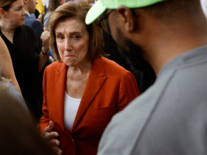 Former Speaker of the House Nancy Pelosi (D-CA) arrives as supporters wait to hear Democra