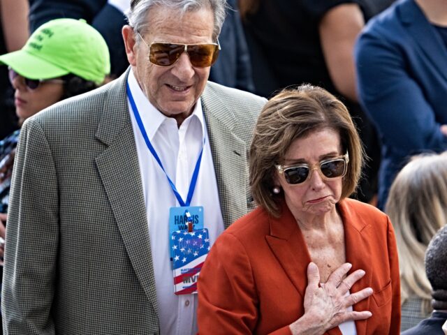 UNITED STATES - NOVEMBER 6: Rep. Nancy Pelosi, D-Calif., and her husband Paul, greets gues