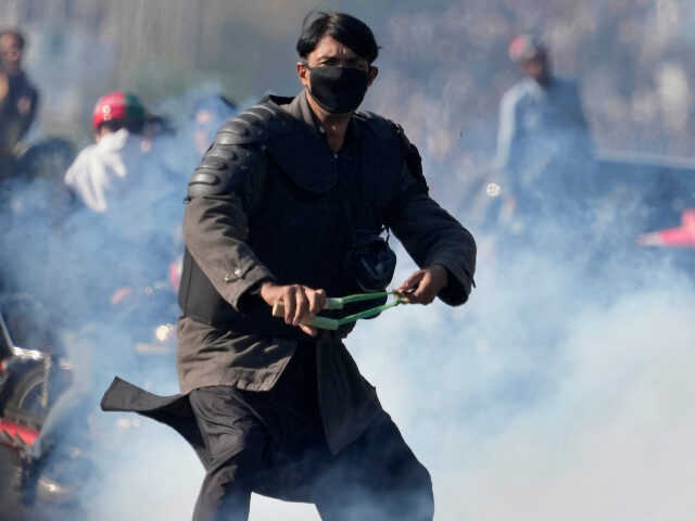 A supporters of imprisoned former premier Imran Khan's Pakistan Tehreek-e-Insaf party