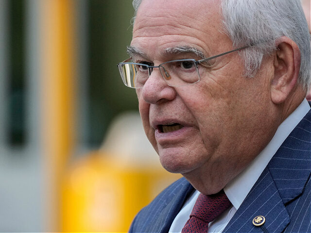 FILE - Sen. Bob Menendez, D-N.J., speaks to the media outside federal court, after being c