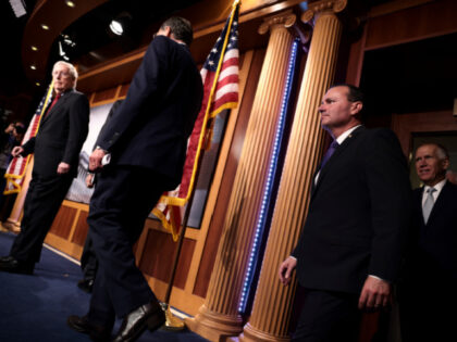 Senate Minority Leader McConnell (R-KY) arrives with Sen. John Barrasso (R-WY), Sen. Mike