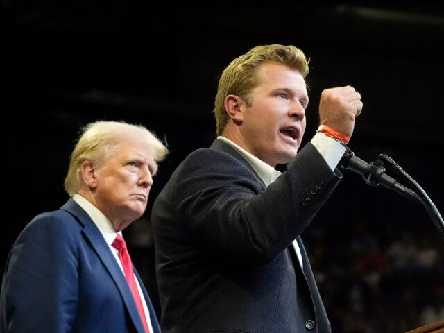 Republican presidential nominee former President Donald Trump listens as Montana Senate ca