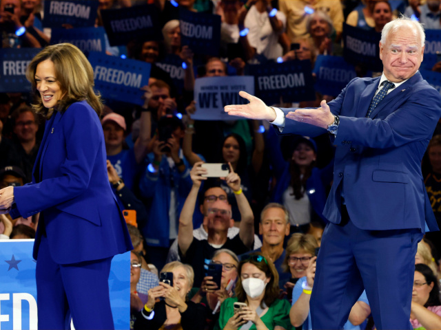 Democratic presidential nominee Vice President Kamala Harris and running mate Minnesota Gov. Tim Walz appear at the Fiserv Forum during a campaign rally in Milwaukee, Tuesday, Aug. 20, 2024. (AP Photo/Jeffrey Phelps)