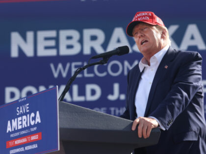 Former President Donald Trump speaks to supporters during a rally at the I-80 Speedway on