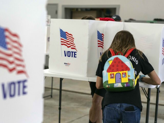 A voter fills out a ballot at the Pleasant Township Fire Department on Election Day, Tuesd