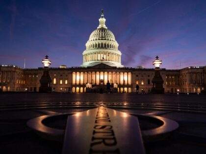 WASHINGTON, DC - AUGUST 25: The sun sets behind the U.S. Capitol Building on a warm, summe