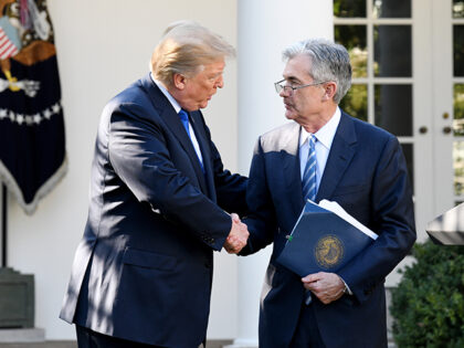 President Donald Trump shakes hands with Jerome Powell, his nominee as chairman of the Fed