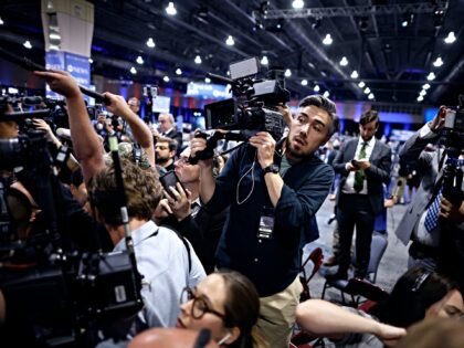 PHILADELPHIA, PENNSYLVANIA - SEPTEMBER 10: Journalists scramble to get a view of Republica