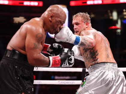 ARLINGTON, TEXAS - NOVEMBER 15: (L-R) Mike Tyson and Jake Paul fight during LIVE On Netfli