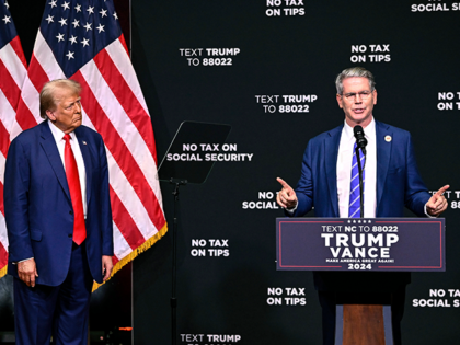 Republican presidential nominee former President Donald Trump, left, listens as investor S